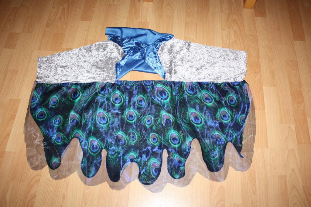 Oberteil mit Flügeln